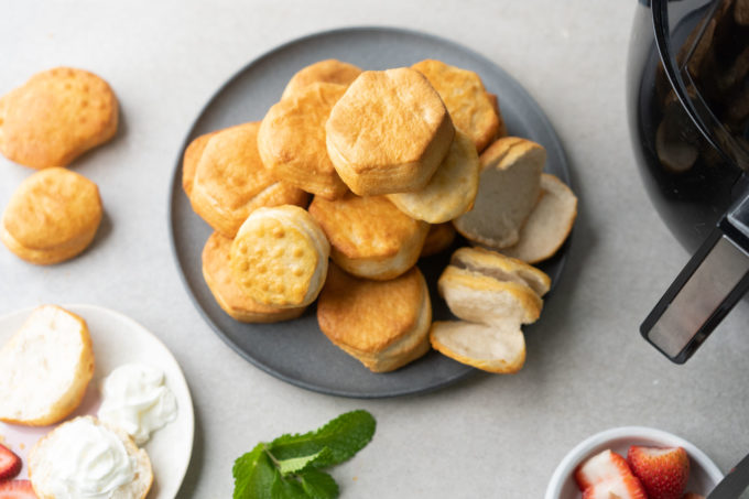 plate of air fryer biscuits with whipped cream