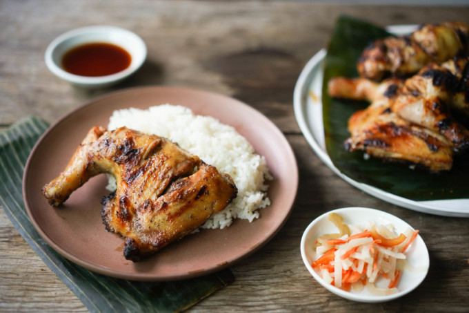 plate of chicken inasal with rice and pickles