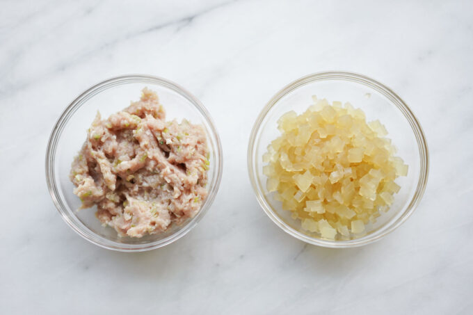 bowl of filling mixture next to soup gelatin