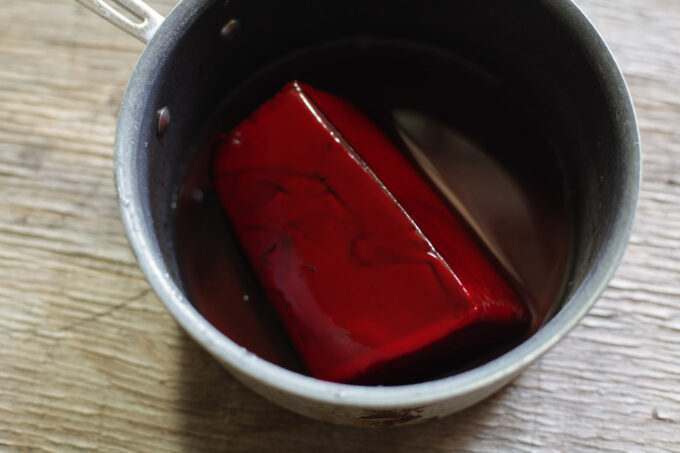 block of congealed pork blood in a pot