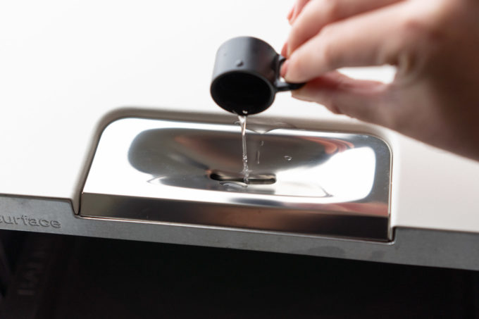 pouring water into the Balmuda toaster