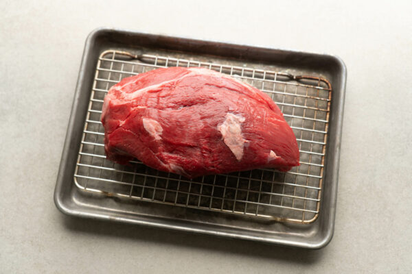 top round beef on baking sheet