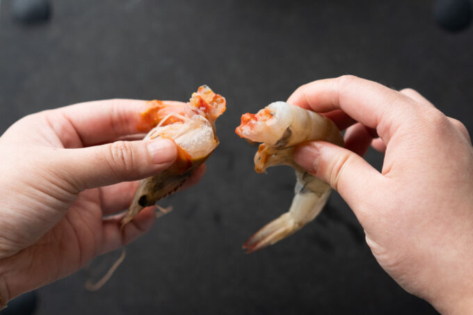 pulling shrimp head off