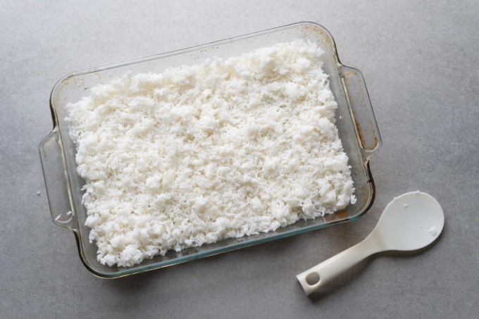 cold rice broken up in baking dish