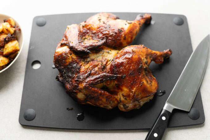 roasted chicken on cutting board