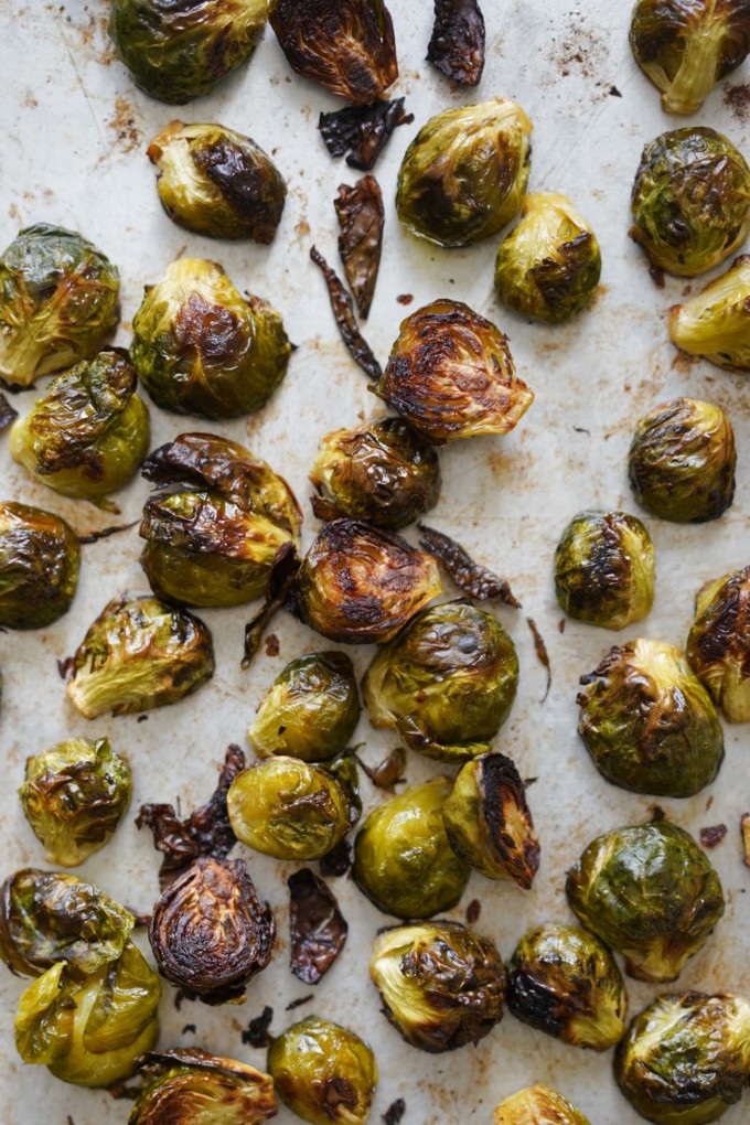 baking sheet with browned crispy brussels