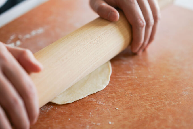 rolling first round of dough balls