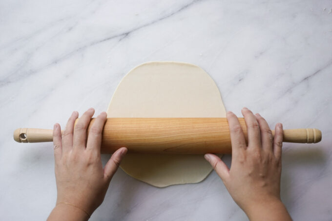 rolling out dough with rolling pin