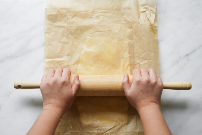 rolling dough with rolling pin