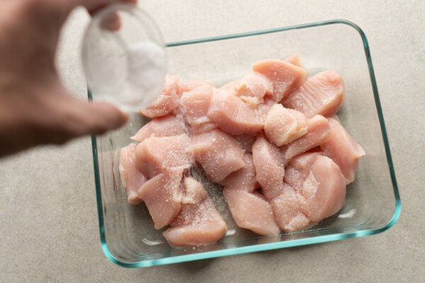 salting chicken breast cubes