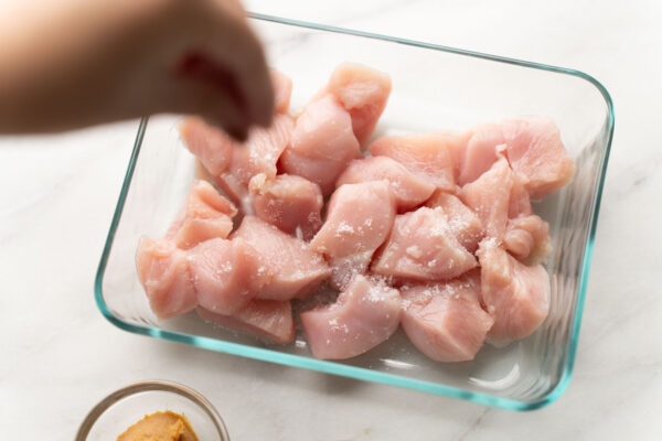 salting chicken breast cubes