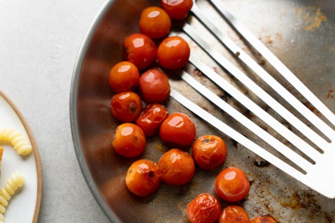 sauteed tomatoes in a pan