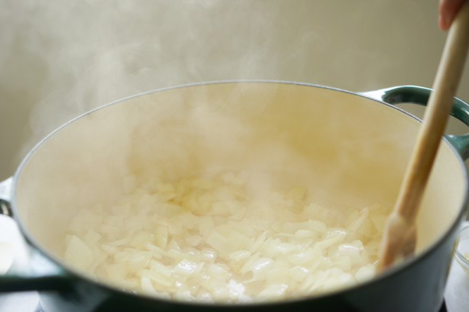 sauteing onions in a pot