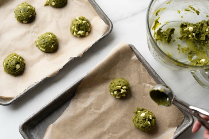scooping matcha cookies with disher