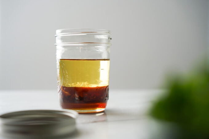 jar of salad dressing ingredients before mixing