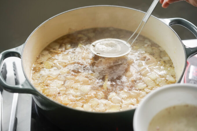 skimming scum off the soup