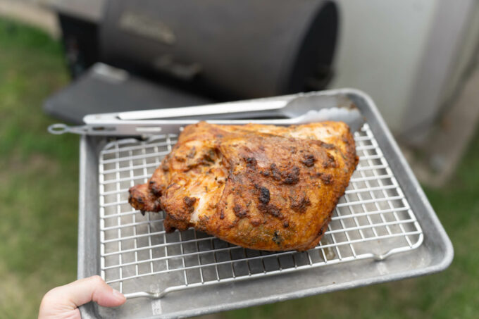 smoked turkey breast resting on tray