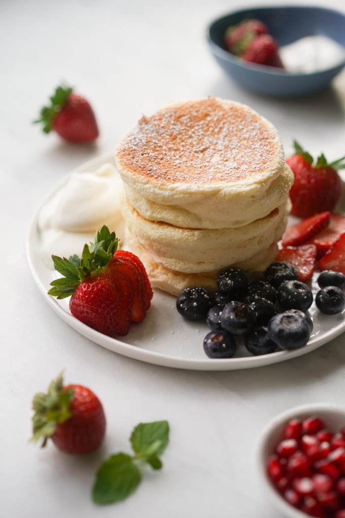souffle pancakes with fruit & whipped cream