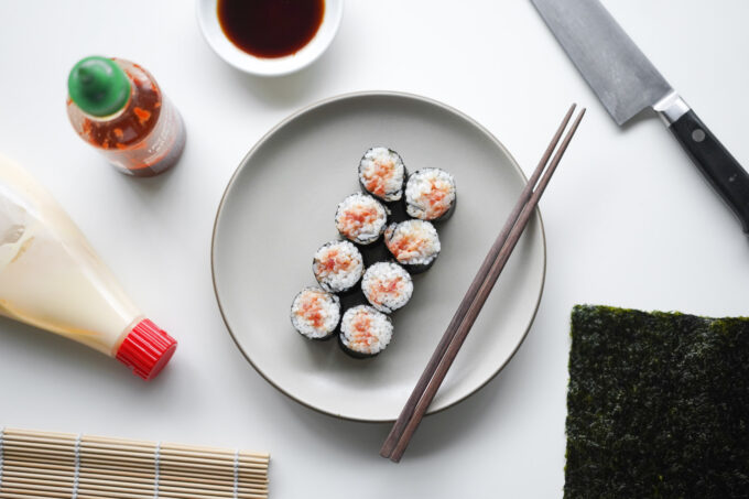 spicy tuna roll overhead view with ingredients and tools