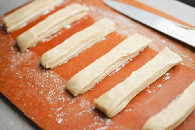 stacked sticks of dough