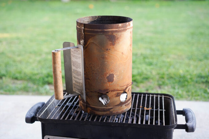 How to Start a Charcoal Grill (Without Lighter Fluid!) 6 chimney with starter material below