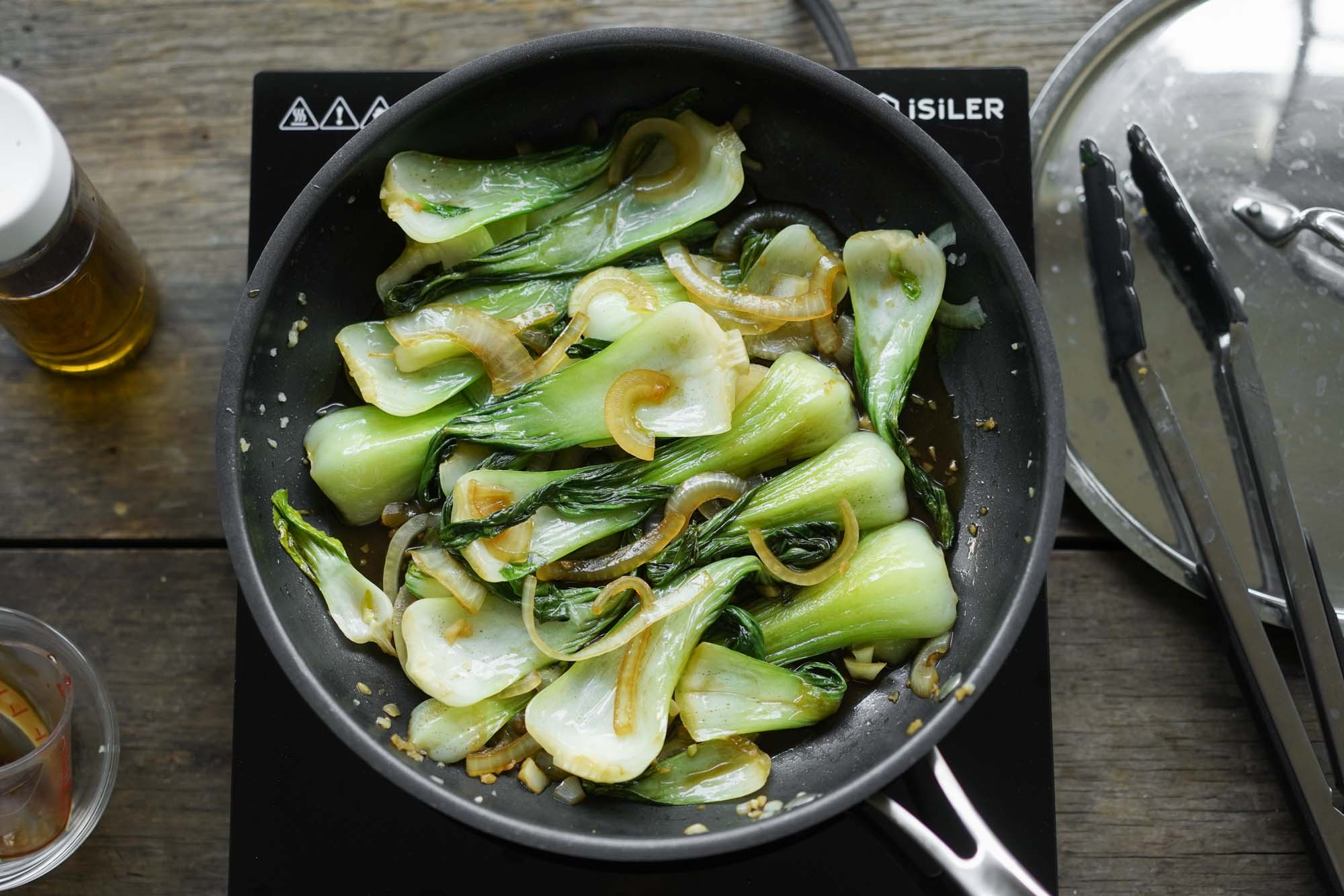 cooked bok choy in a pan