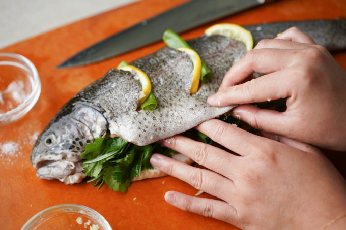 stuffing fish with herbs and lemon