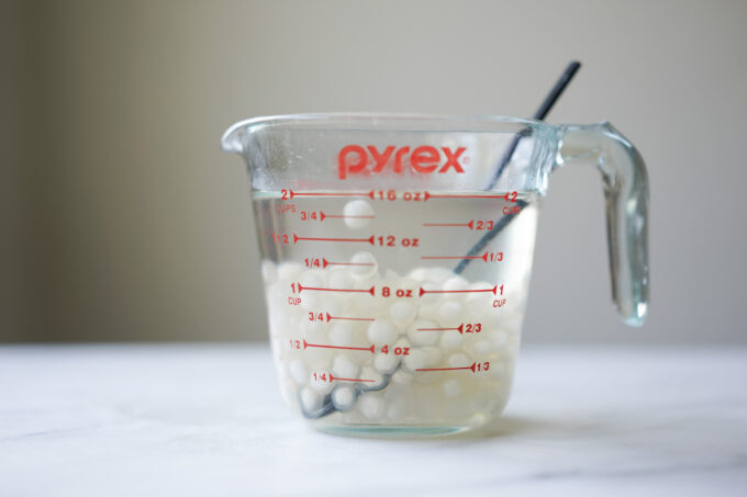 cup of tapioca pearls soaking in syrup