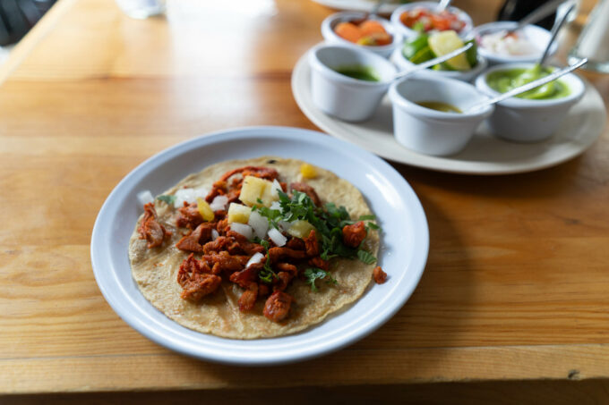 Tacos Roy taco al pastor with salsa plate