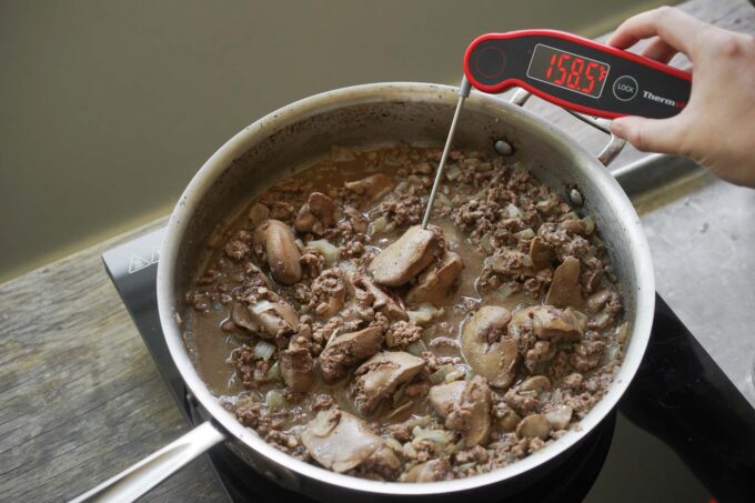 taking temp of chicken liver