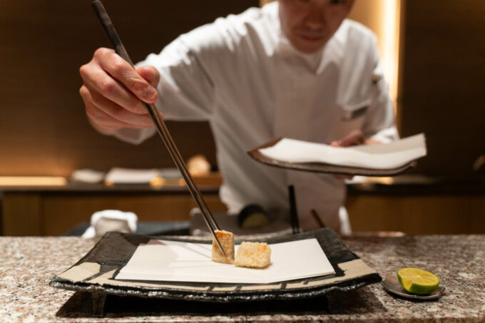 Tatsumi chef plating tempura veggies