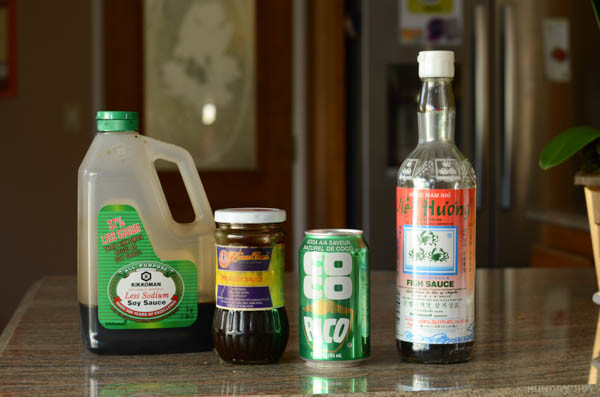 bottles of soy sauce, coconut soda, and fish sauce