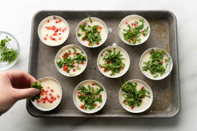 adding toppings on egg white bite cups
