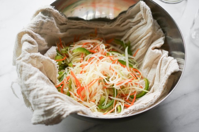 papaya and veggies in cheesecloth