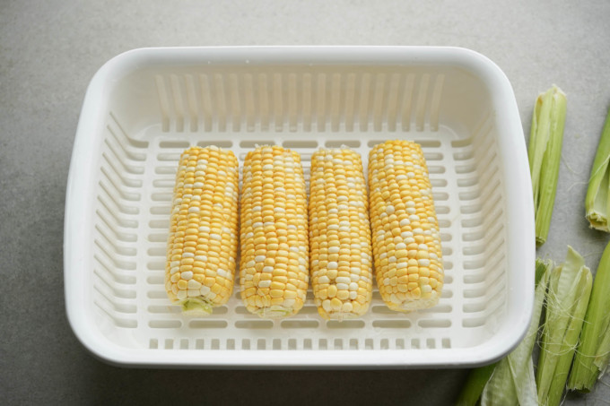 washed corn in a basket