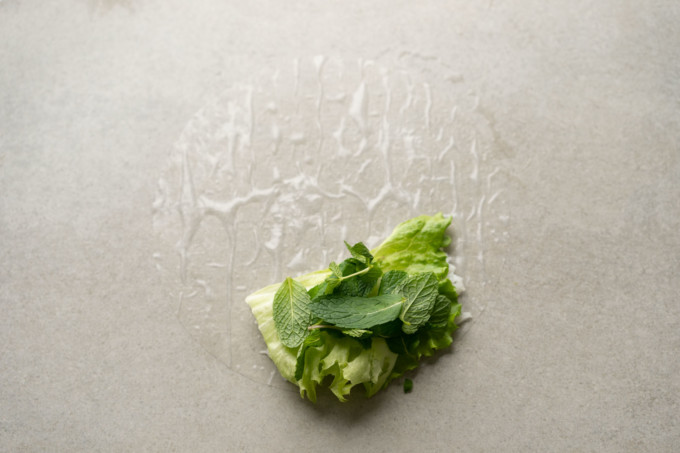 lettuce and herbs on wrapper