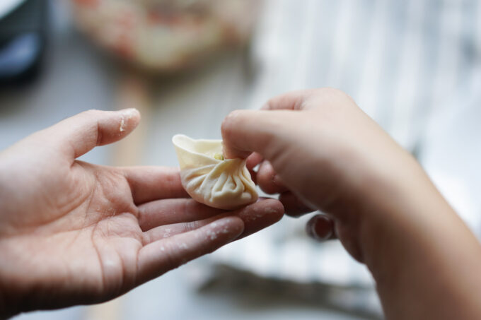 beginning to wrap part of the xiao long bao