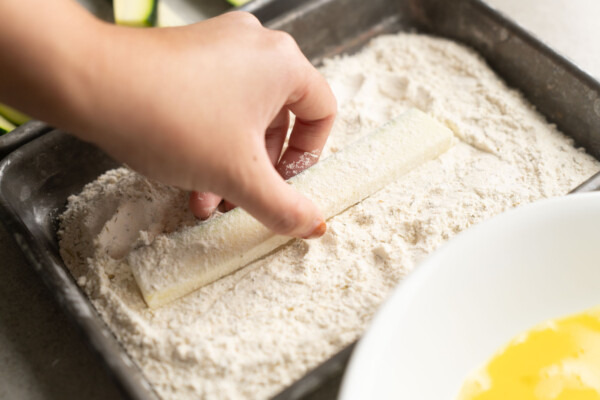 coating zucchini in flour